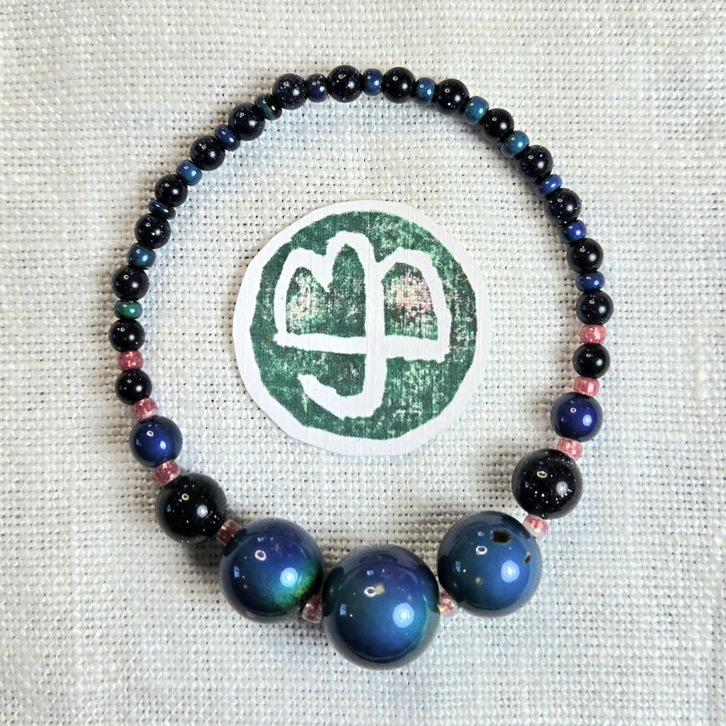 11: Mood beads, blue goldstone