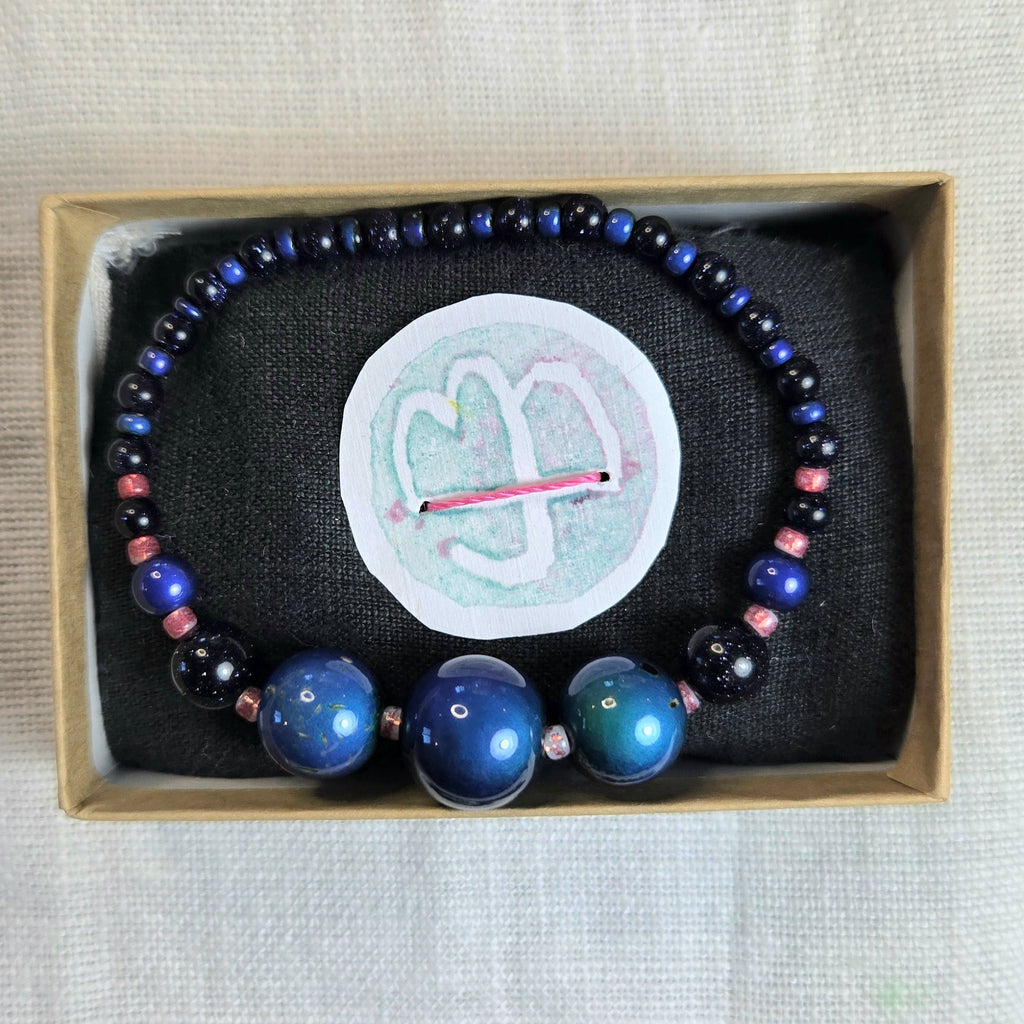 11: Mood beads, blue goldstone