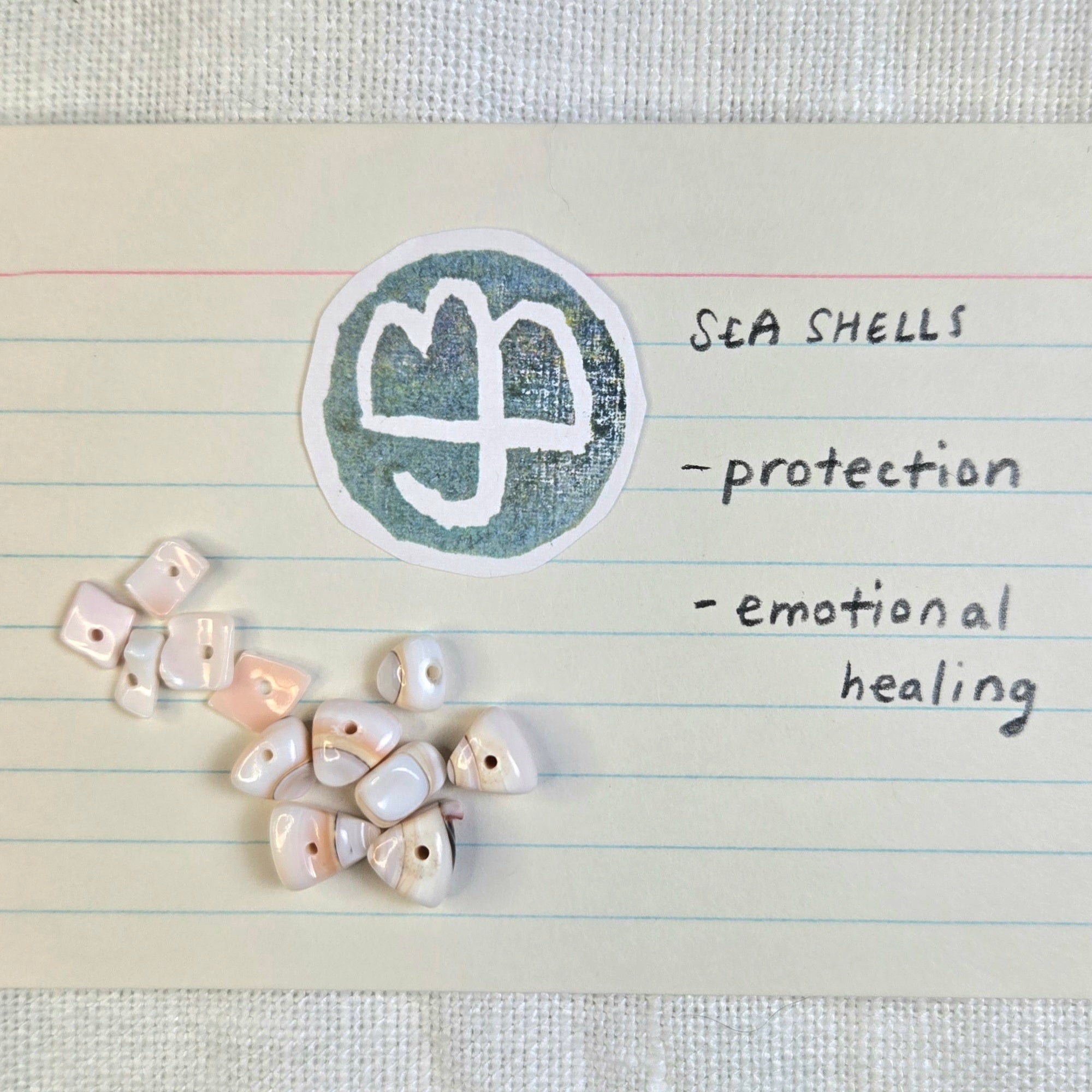 28: Moonstone skull, vintage jade, seashell, mother of pearl, ceramic